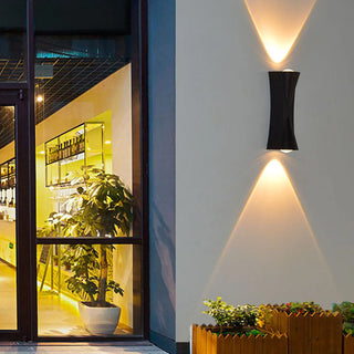 Black Simple Curved Geometric Exterior LED Wall Light Image - 1