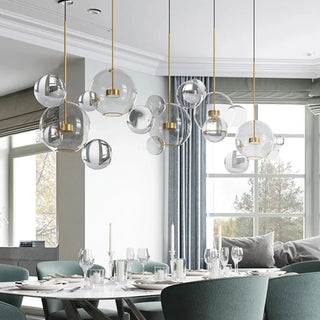 Casual LED Light Fixture with Translucent Glass Ball Pendant and Subdued Light via Cord Zawala Image - 1