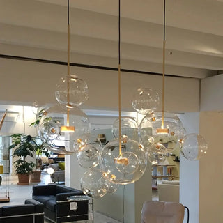 Casual LED Light Fixture with Translucent Glass Ball Pendant and Subdued Light via Cord Zawala Image - 3