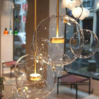 Casual LED Light Fixture with Translucent Glass Ball Pendant and Subdued Light via Cord Zawala Image - 4