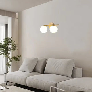 Gold and Frosted Glass Double Globe Vanity Light Zawala Image - 2