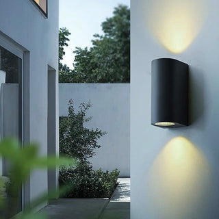 Modern Black Geometric Outdoor Mini LED Wall Light Zawala Image - 1