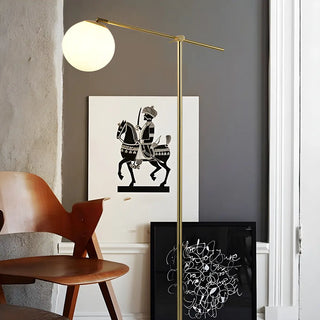 Minimalist Modern Globe Gold Metal LED Floor Lamp Zawala Image - 1