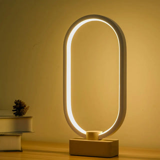 Modern Simple Oval LED Warm White Acrylic Table Lamp Image - 3