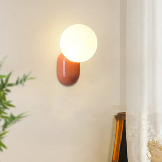 Modern Minimalist White Globe Resin LED Wall Light Zawala Image - 2