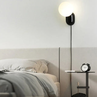 Modern Minimalist White Globe Resin LED Wall Light Zawala Image - 4