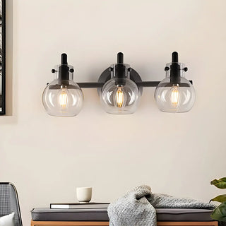 Simple Clear Glass Globe Black 3-Bulb Wall Vanity Light Zawala Image - 3