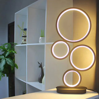 Simple Stylish Black Round 4 Lights LED Table Lamp Zawala Image - 2