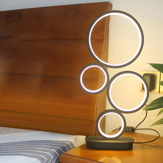 Simple Stylish Black Round 4 Lights LED Table Lamp Zawala Image - 3