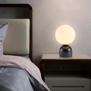 Modern Simple White Globe Ceramic Black Base Table Lamp Zawala Image - 1