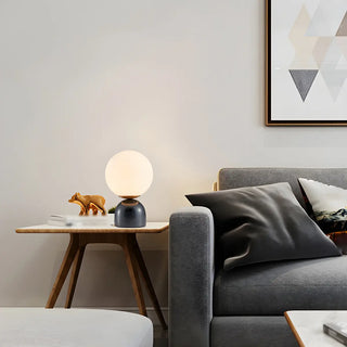 Modern Simple White Globe Ceramic Black Base Table Lamp Zawala Image - 4