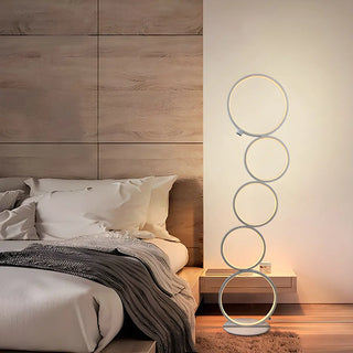 Artistic Modern Stacked Ring LED Bedside Floor Lamp Zawala Image - 1