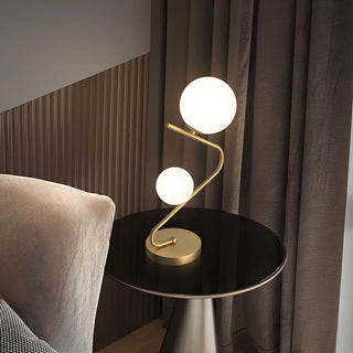 Simple Dual Opal Glass Globes Brass Curved Table Lamp Zawala Image - 2
