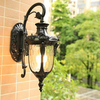 Elegant Lantern Bronze Glass Outdoor LED Wall Lamp Zawala Image - 2